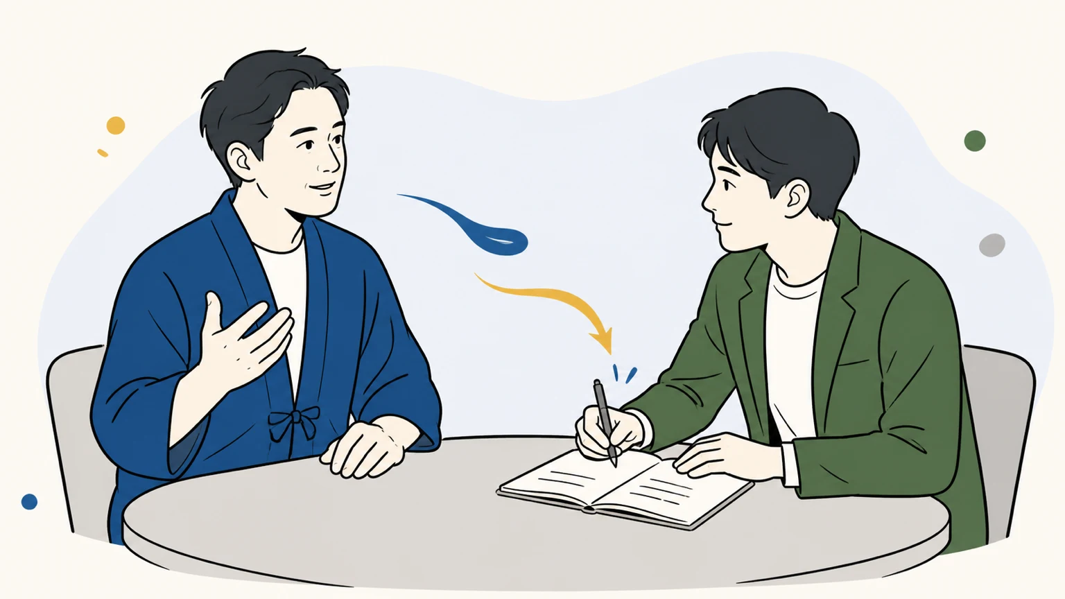 経営者の話を聞きながら制作スタッフが原稿メモを取る様子